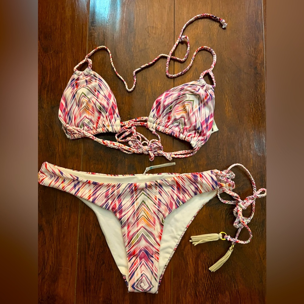 Bettinis braided bikini. Size medium bottom, size small padded triangle top.